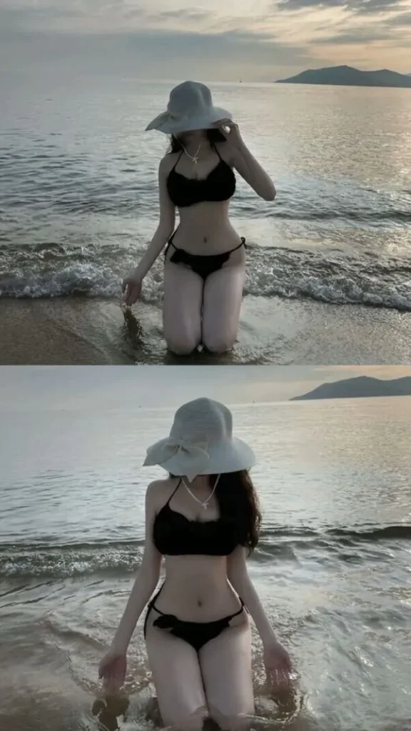 Túi cói cầm hờ bên hông, cô gái quay lưng, bikini ôm eo, đôi chân thon, vibe đi biển rất sang.